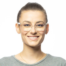 women wearing clear frame reading glasses